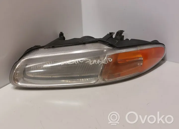 Chrysler Stratus Lampa przednia 962913-02