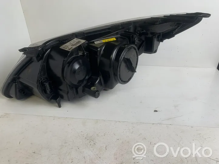 Saab 9-3 Ver2 Lampa przednia 12770144