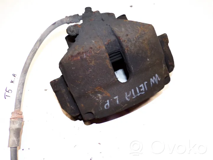 Volkswagen Jetta VI Front brake caliper 