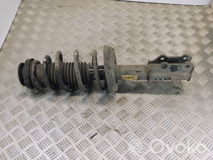 Opel Zafira C Front shock absorber with coil spring 13338923