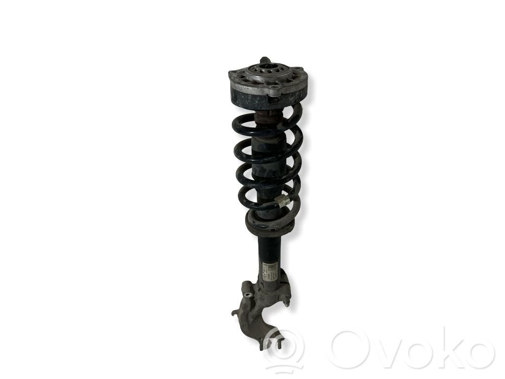 Front shock absorber with coil spring   E5407401
