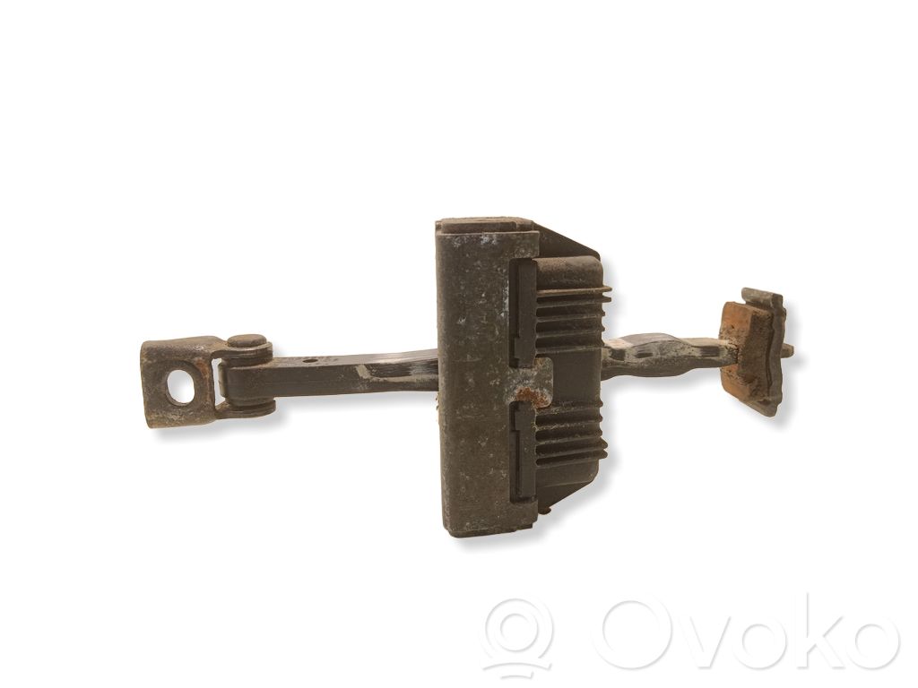 Front door check strap stopper   7033609