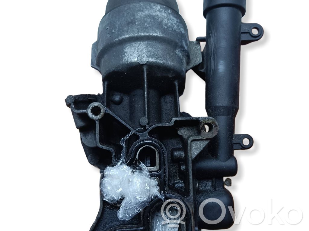 Opel Corsa D Oil filter mounting bracket 