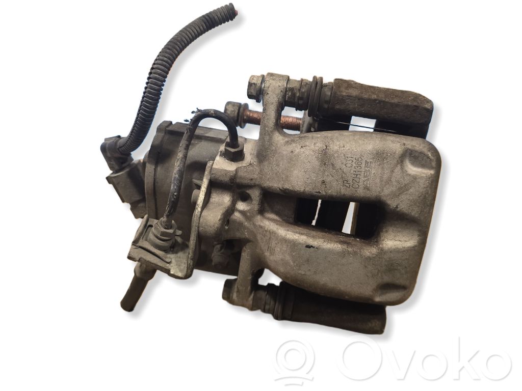 Volkswagen PASSAT B6 Caliper del freno trasero 