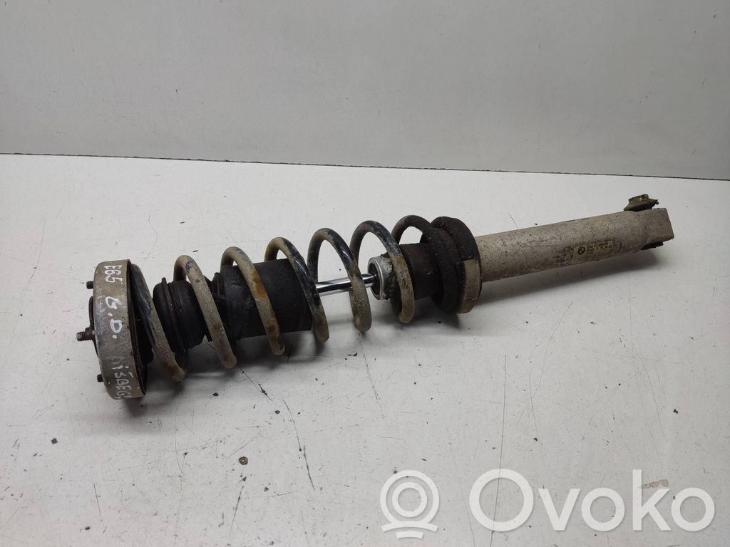 BMW 7 E65 E66 Takaiskunvaimennin kierrejousella 