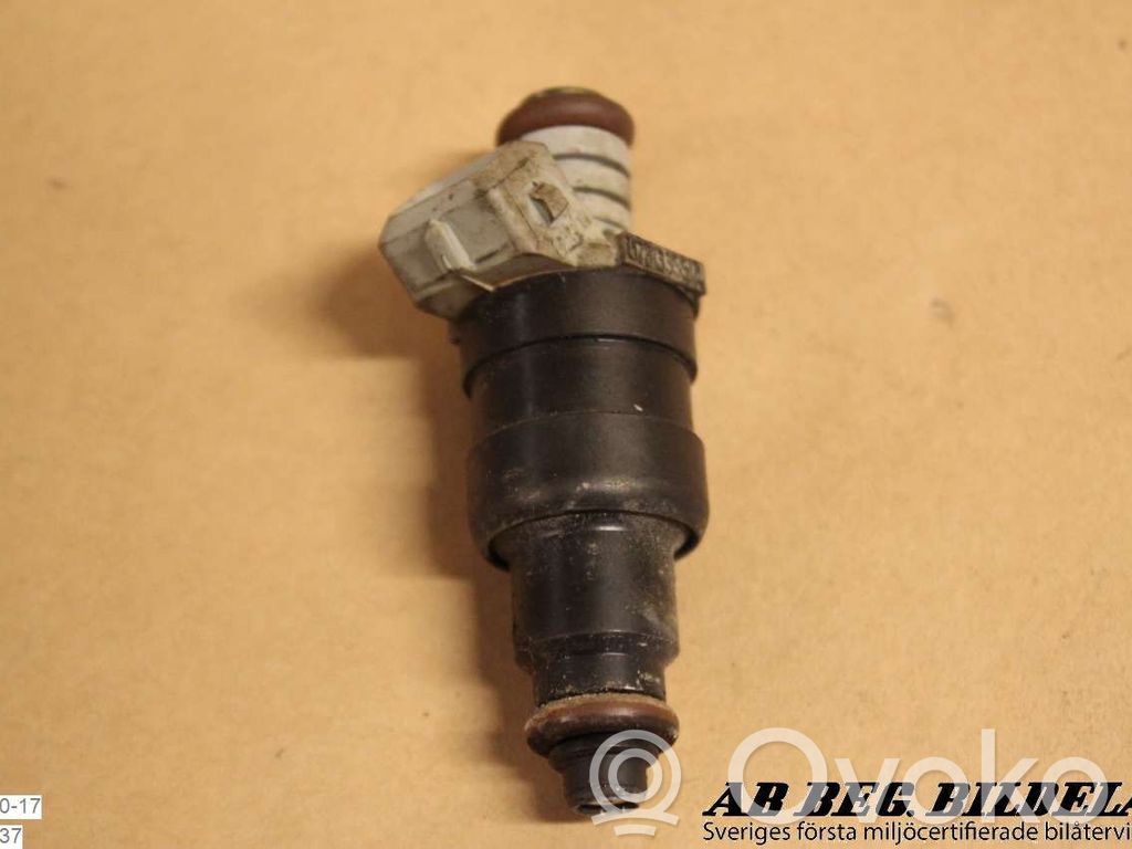 Inyector de combustible   078133551A