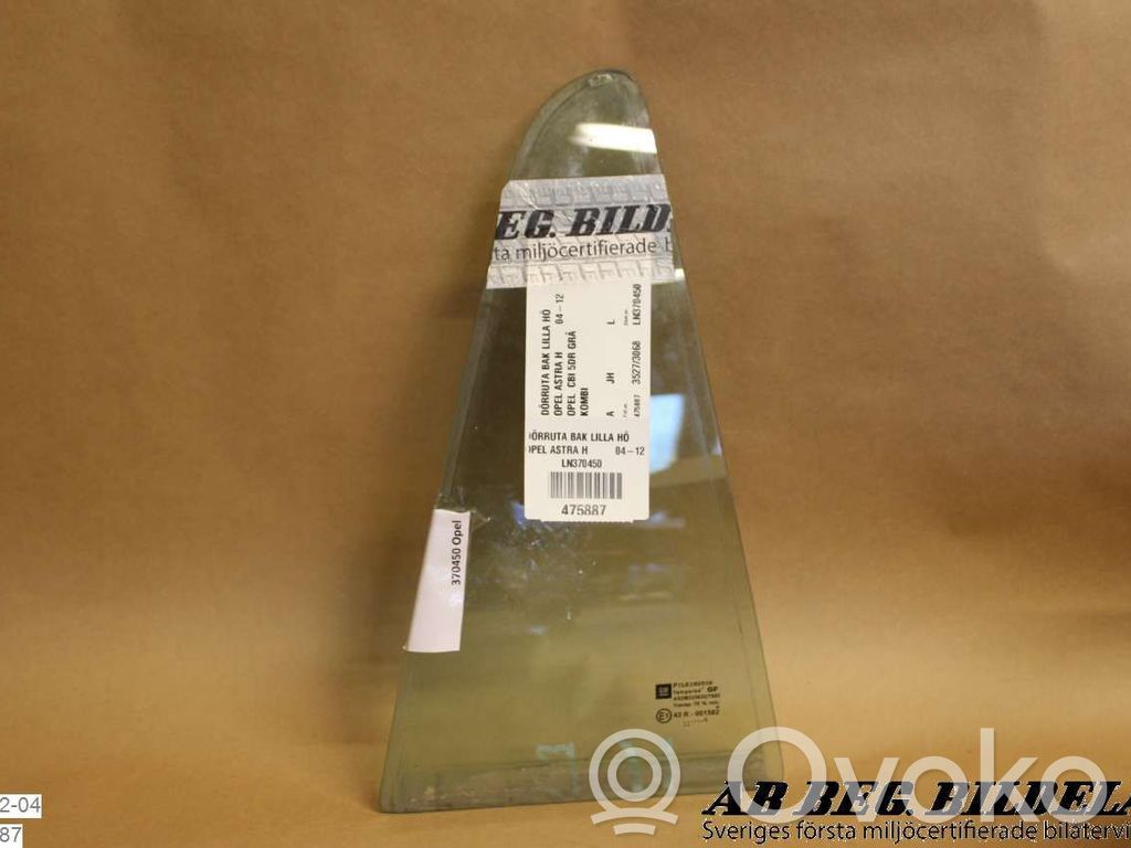 Opel Astra H Ventanilla de ventilación de la puerta trasera 