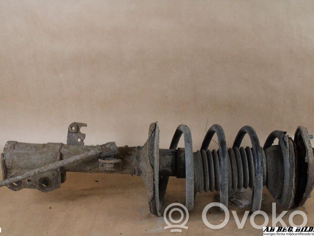 Toyota Corolla E120 E130 Front shock absorber with coil spring 