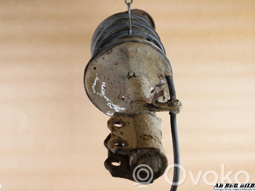 Toyota Corolla E120 E130 Front shock absorber with coil spring 