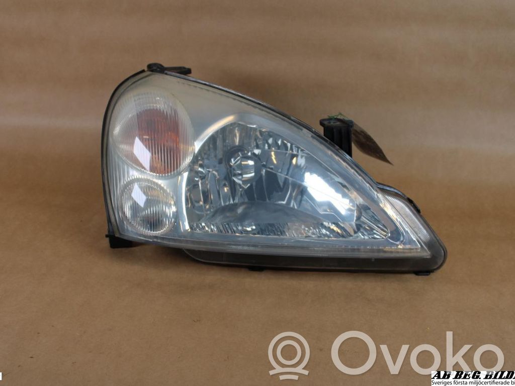 Suzuki Liana Lampa przednia 