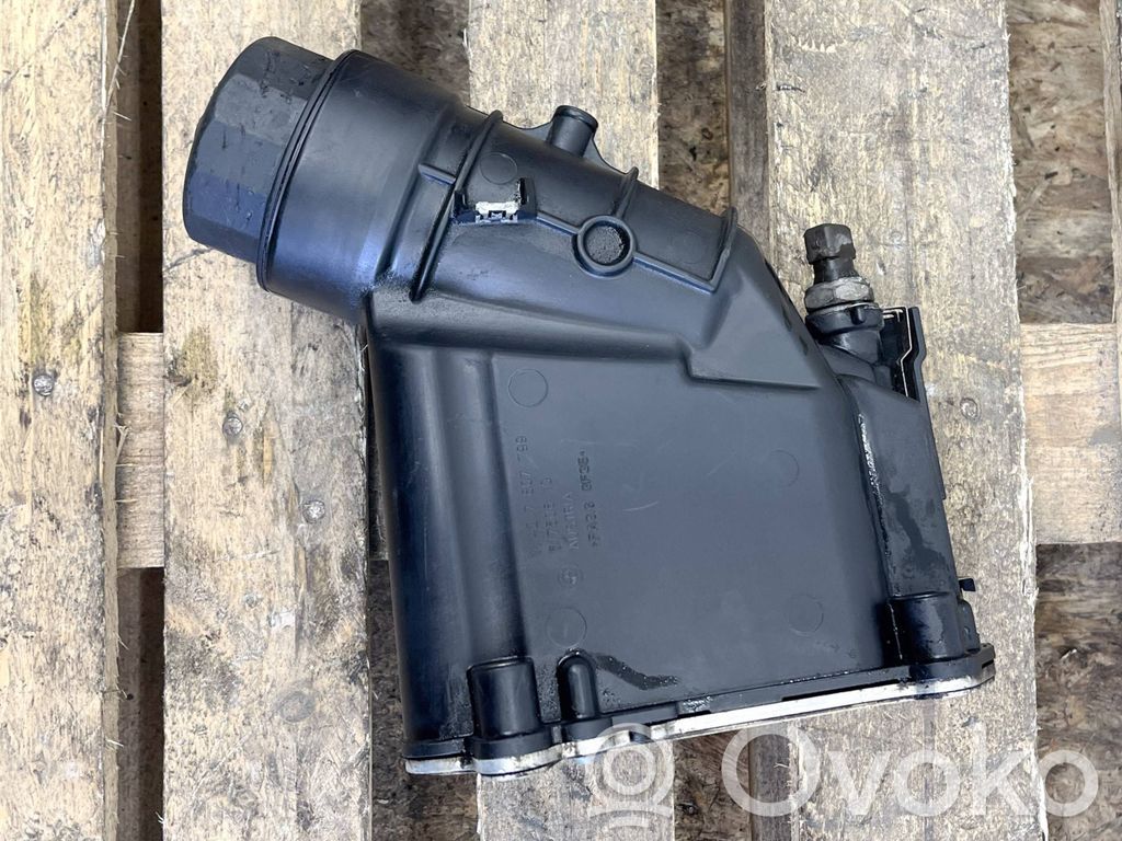 Oil filter mounting bracket   7807799,11427807799,51750610,11427802114,70346292,7802114