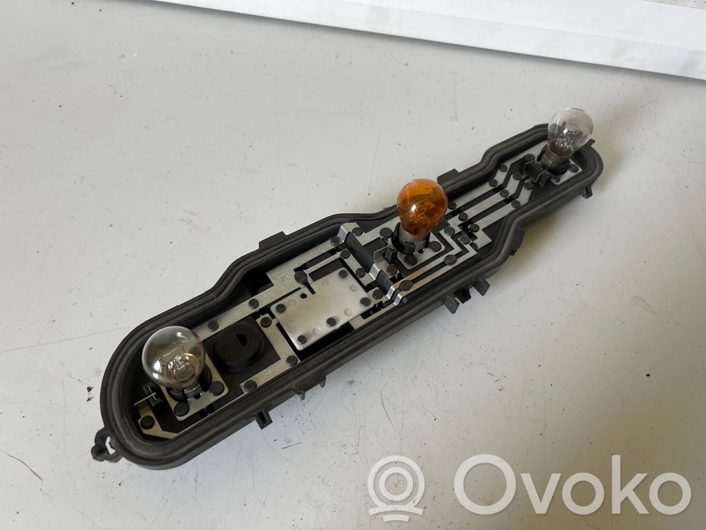 Dacia Dokker Takavalon polttimon suojan pidike 