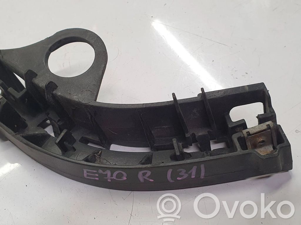 Front bumper mounting bracket   7165472