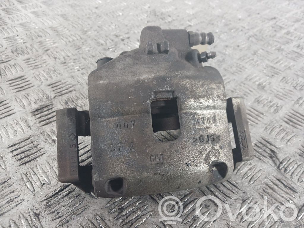 Opel Corsa E Front brake caliper 