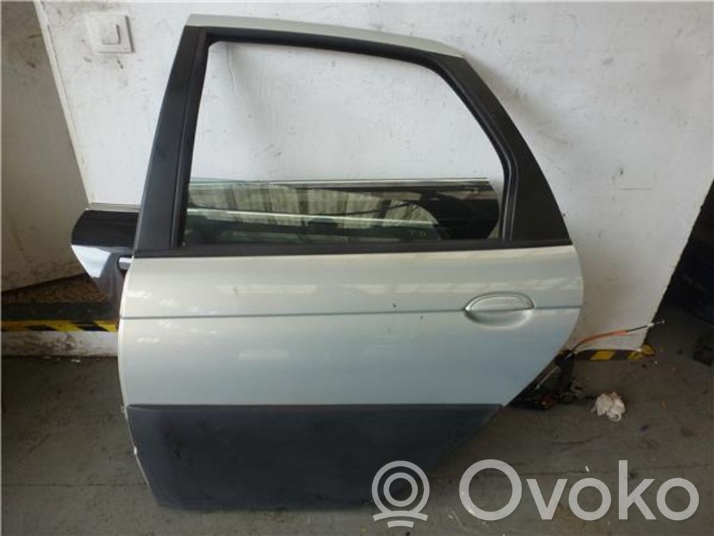 Puerta trasera   7751472407