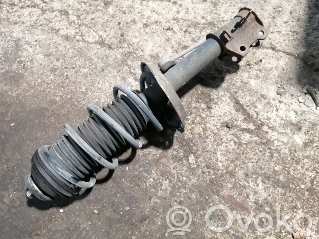 Opel Corsa D Priekšpusē amortizators ar atsperi 
