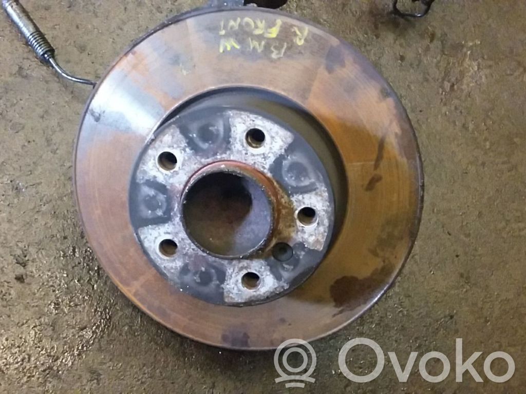 Front wheel hub spindle knuckle