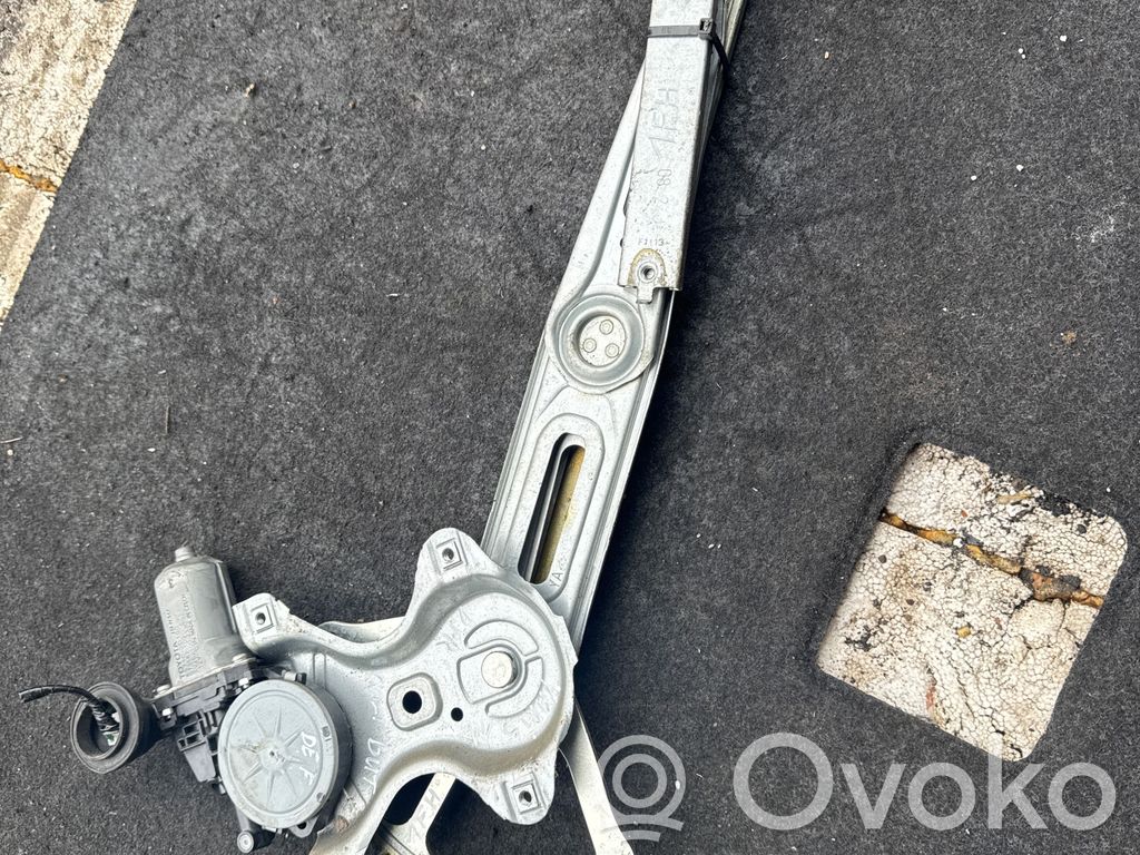 Toyota Yaris Elektryczny podnośnik szyby drzwi przednich 