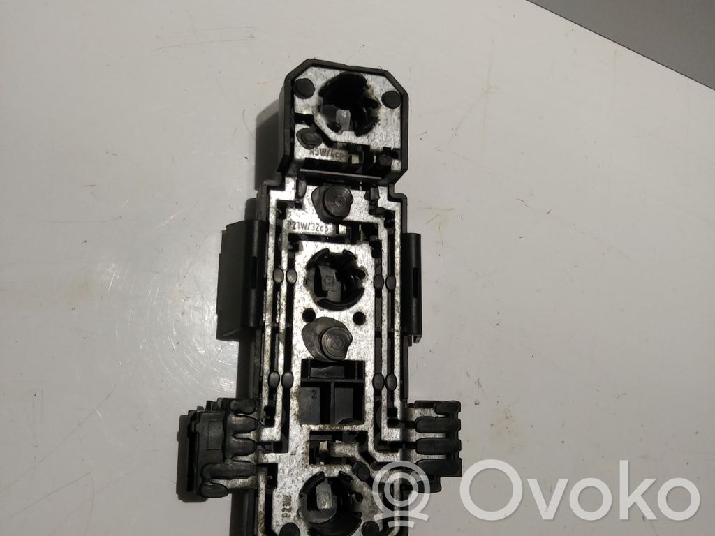 Volvo 960 Aizmugures spuldzes vāka turētājs 