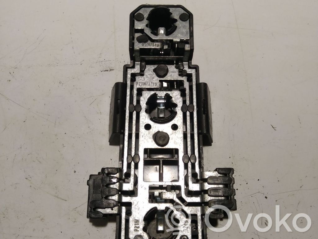 Volvo 960 Aizmugures spuldzes vāka turētājs 