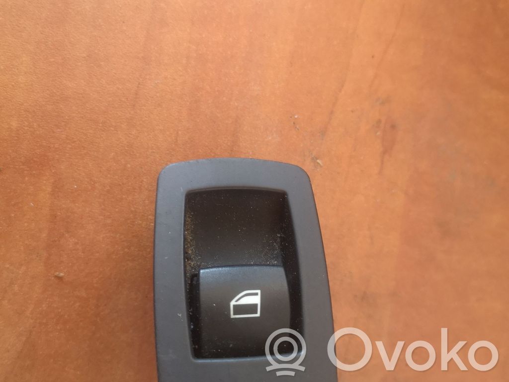 Electric window control switch   6945874