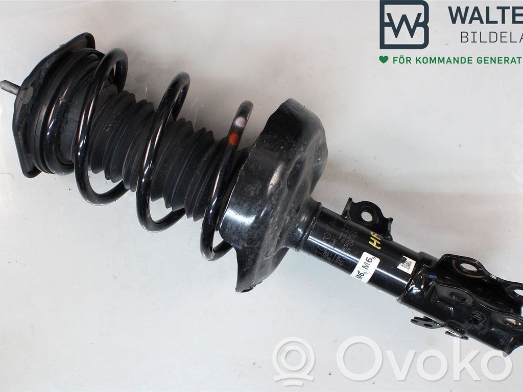 Toyota Corolla E210 E21 Front shock absorber with coil spring 