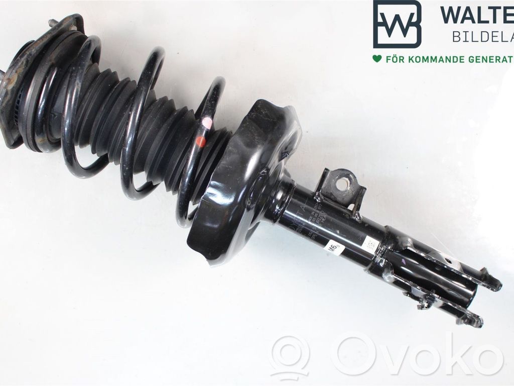 Toyota Corolla E210 E21 Front shock absorber with coil spring 