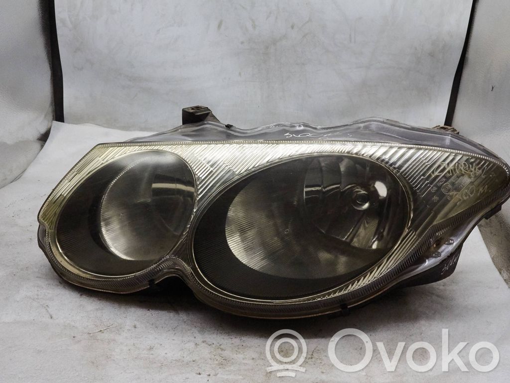 Scheinwerfer   04780013AC