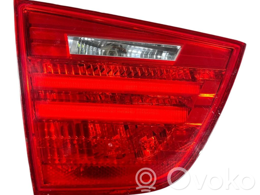BMW 3 E90 E91 Aizmugurējais lukturis pārsegā 