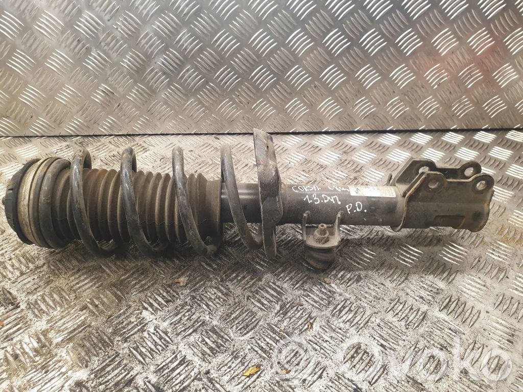 Opel Corsa D Amortyzator osi przedniej ze sprężyną 