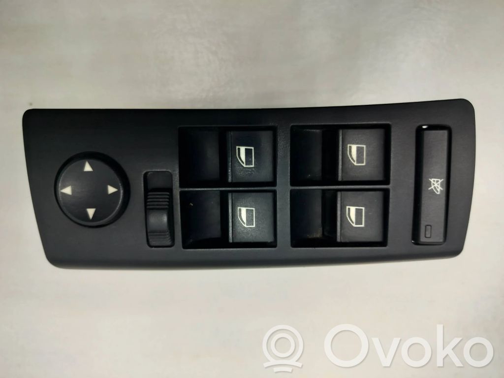 Electric window control switch   6952798