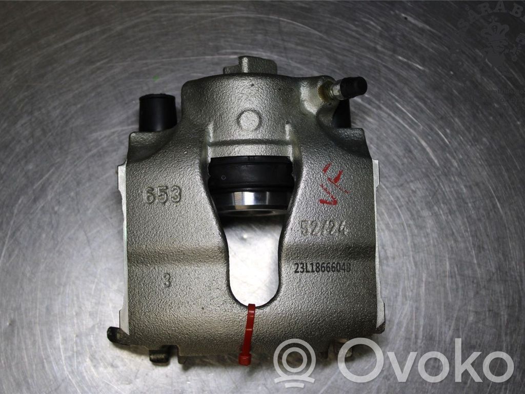 Opel Astra G Zacisk hamulcowy przedni 