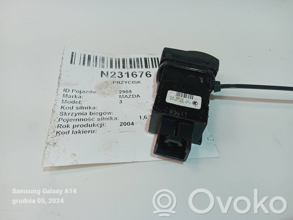 Mazda 3 I Otros interruptores/perillas/selectores 