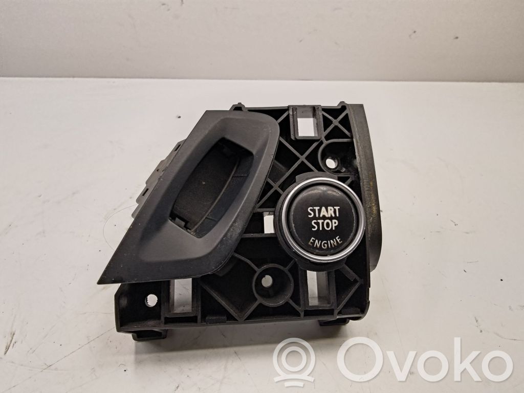 BMW X5 E70 Automobilio užvedimo jungtukas 