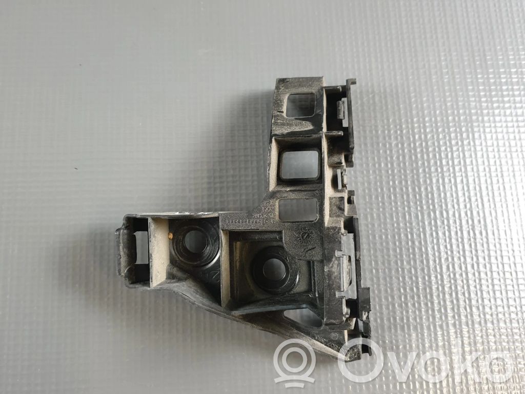 Volkswagen Golf VII Uchwyt / Mocowanie zderzaka tylnego 