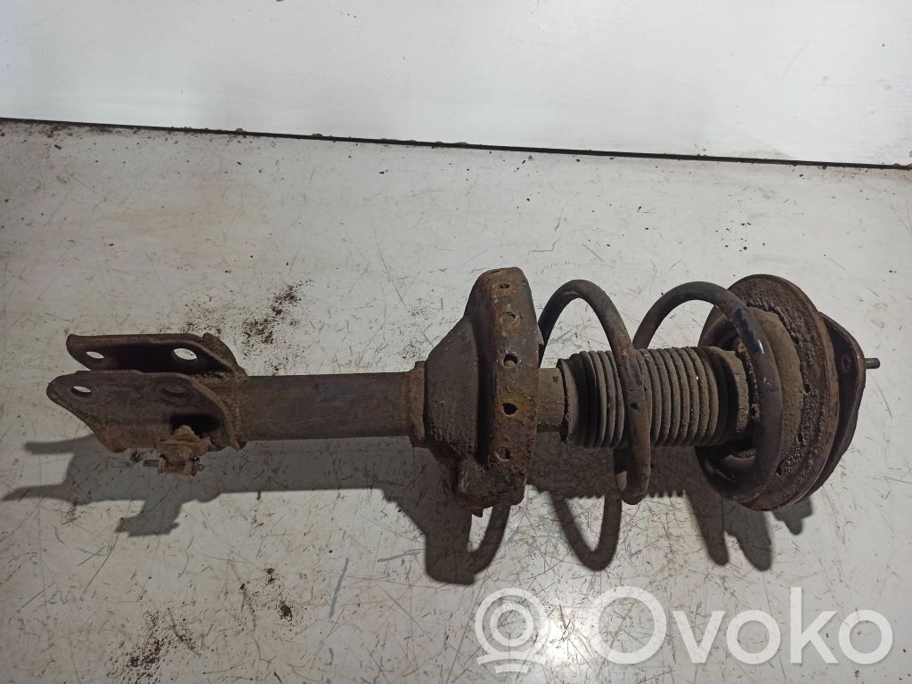 Front shock absorber with coil spring
