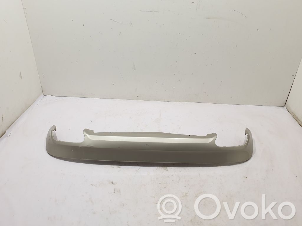 Volvo XC60 Moldura inferior del parachoques trasero 
