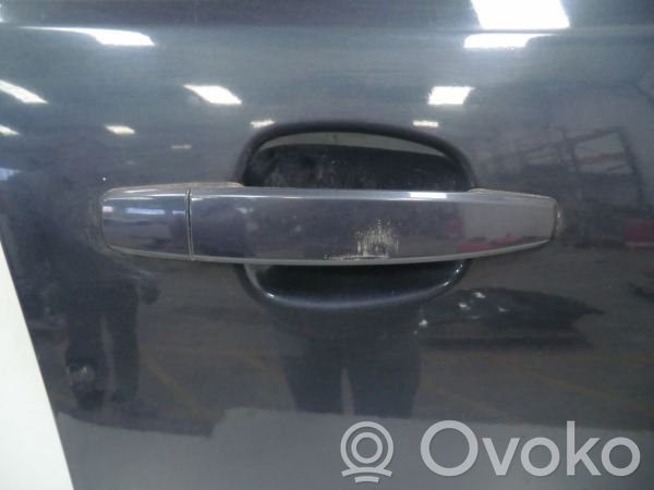 Opel Astra H Front door exterior handle 