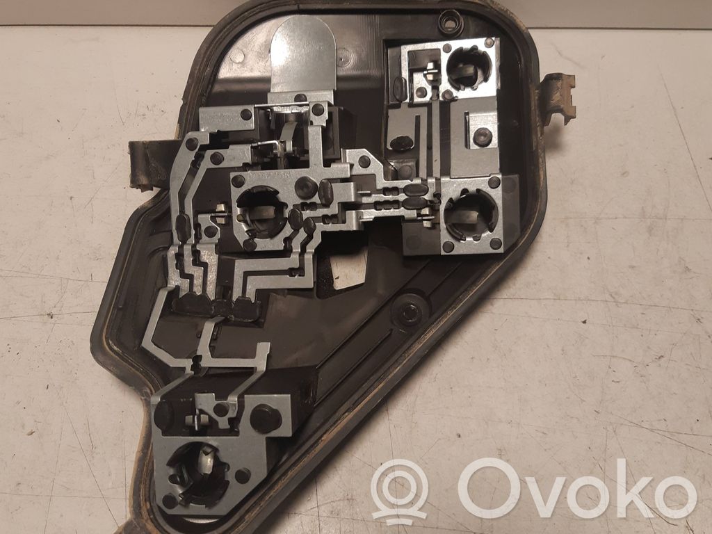 Opel Astra H Aizmugures spuldzes vāka turētājs 