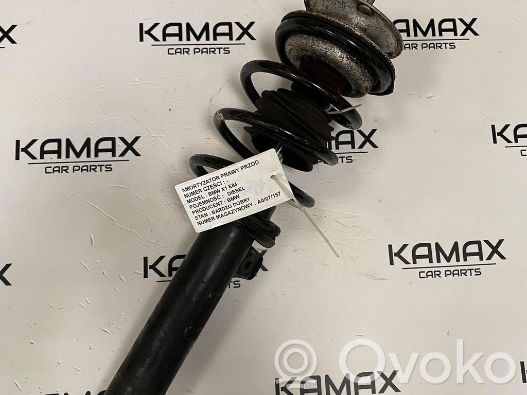 BMW X1 E84 Etuiskunvaimennin kierrejousella 