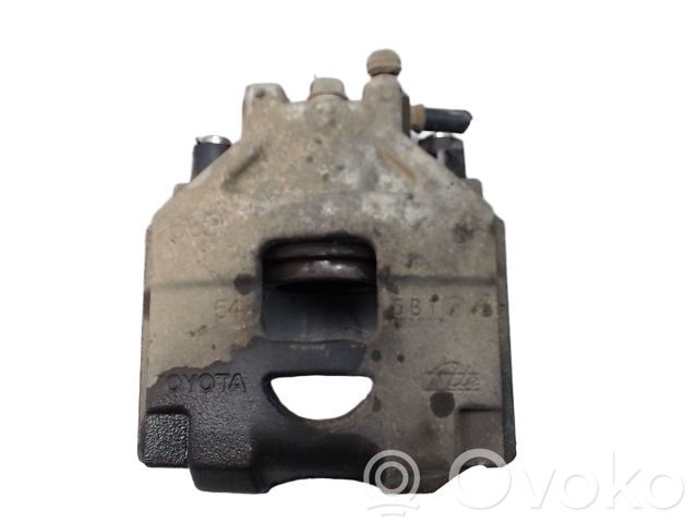 Toyota Yaris Zacisk hamulcowy przedni 