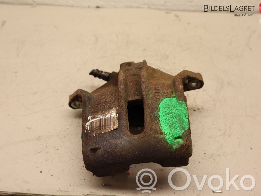Peugeot 208 I Front brake caliper 