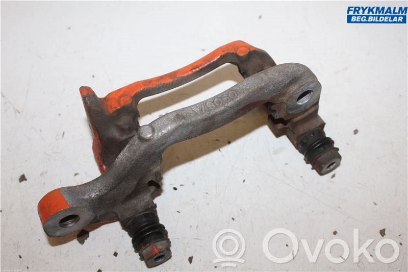 Nissan Qashqai Mocowanie / Zacisk hamulca tylnego 