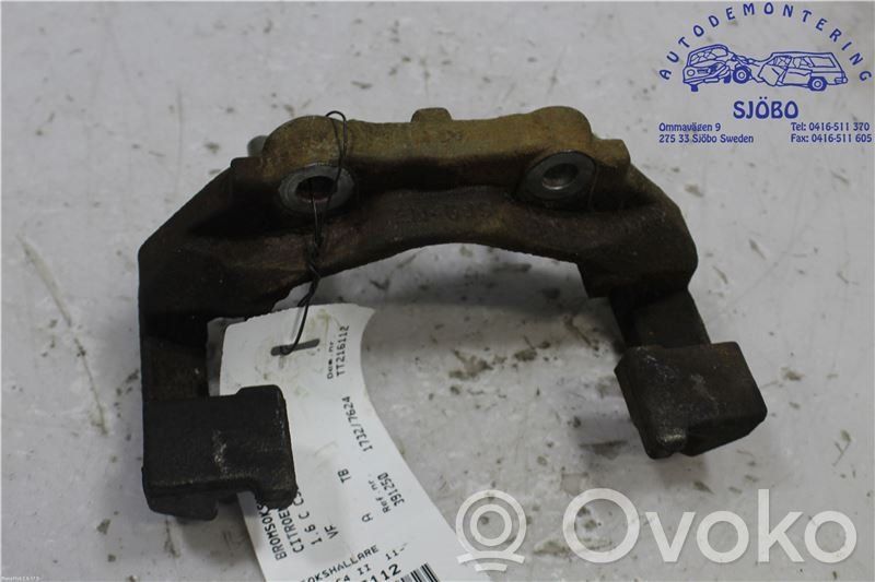 Citroen C4 II Mocowanie przedniego zacisku hamulca 