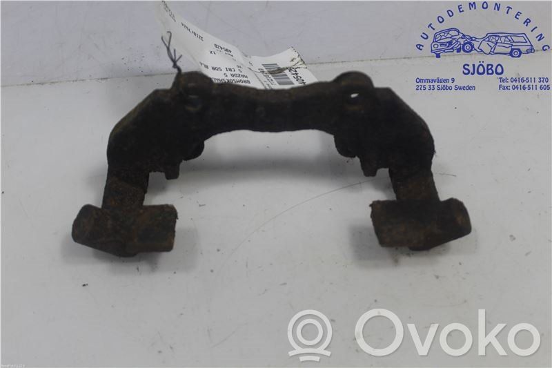 Mazda 5 Mocowanie przedniego zacisku hamulca 