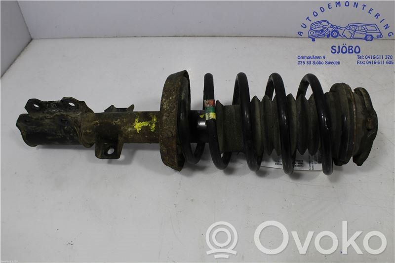 Front shock absorber with coil spring