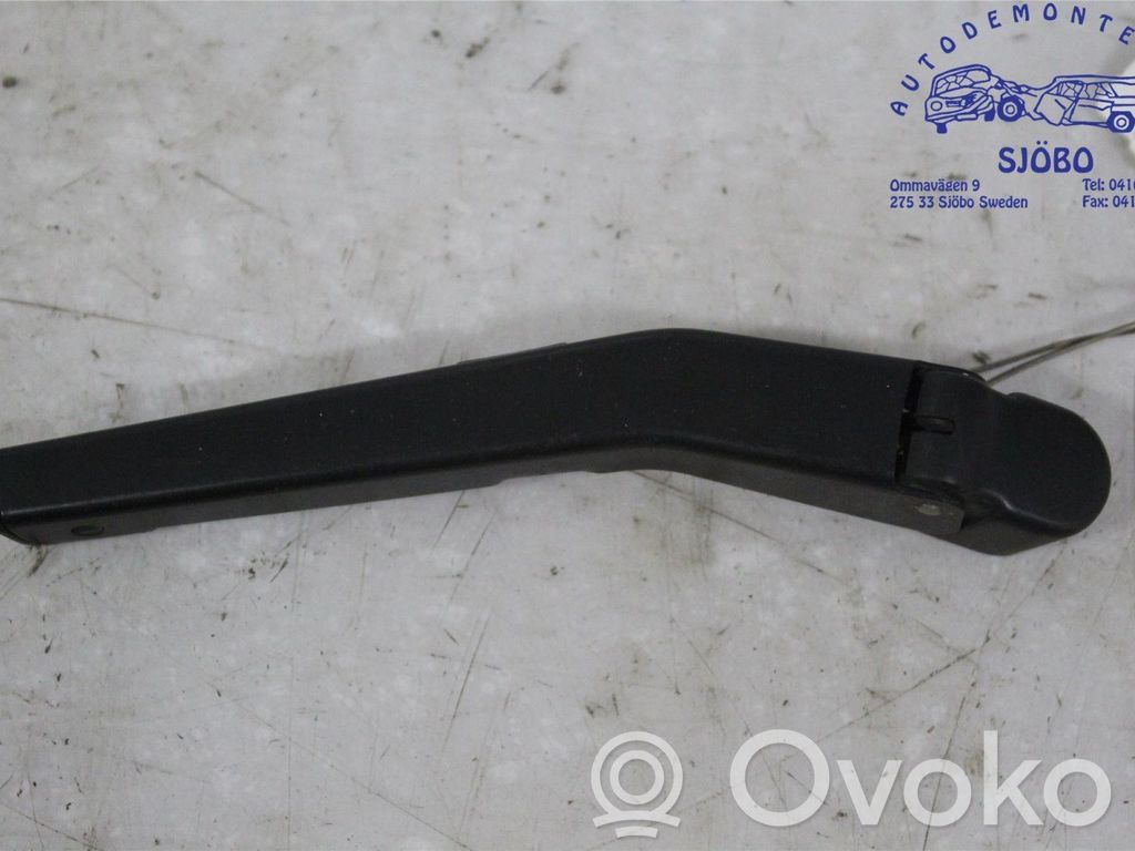 Headlight wiper arm
