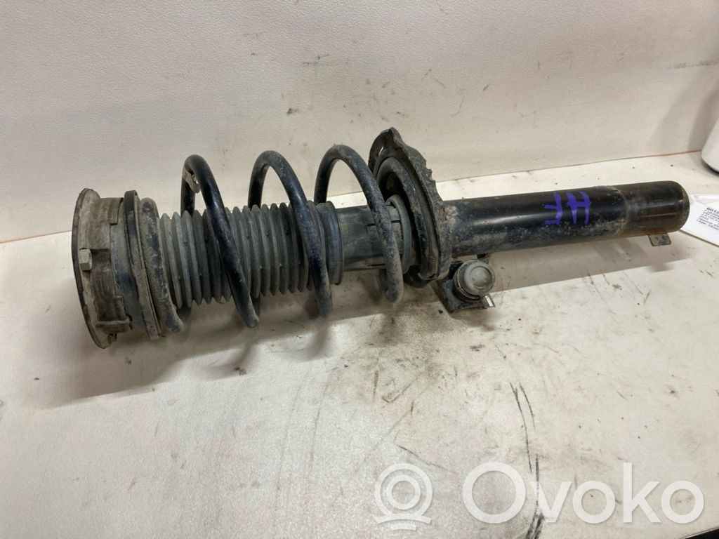 Volkswagen Caddy Amortyzator osi przedniej ze sprężyną 
