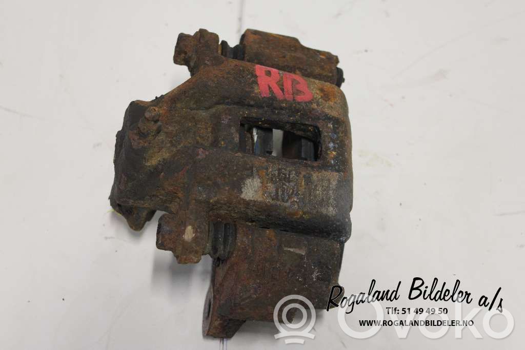 Toyota Land Cruiser (J120) Tylny zacisk hamulcowy 