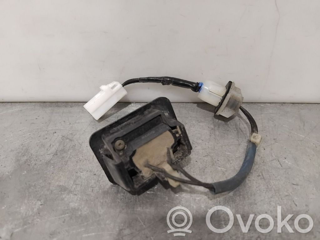 Mazda 6 Interruptor para abrir la puerta trasera